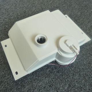 Water tank viewed from under the roller press